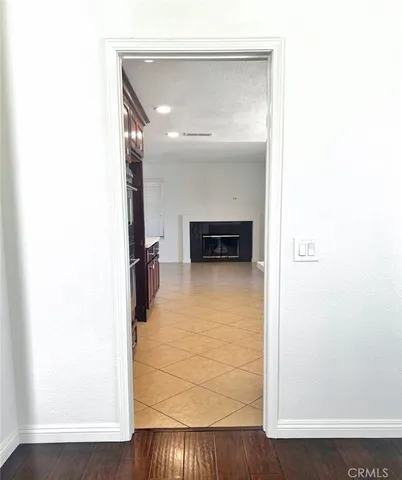 a kitchen with stainless steel appliances a refrigerator and cabinets