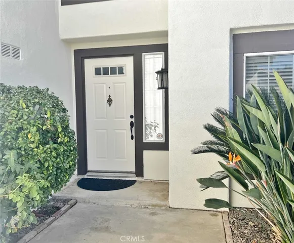 a view of a potted plants in front of a door