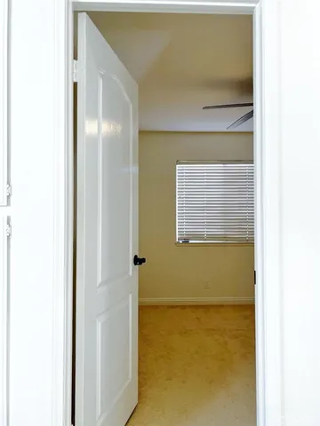 a bathroom with a granite countertop sink mirror and double