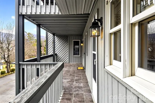 a view of a porch of a house