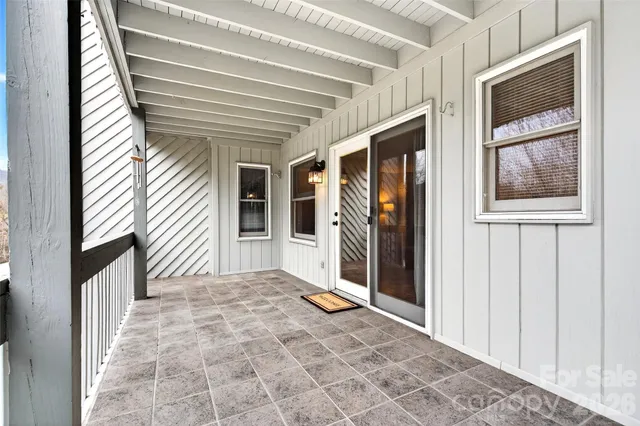 a bathroom with a sink a mirror and a shower