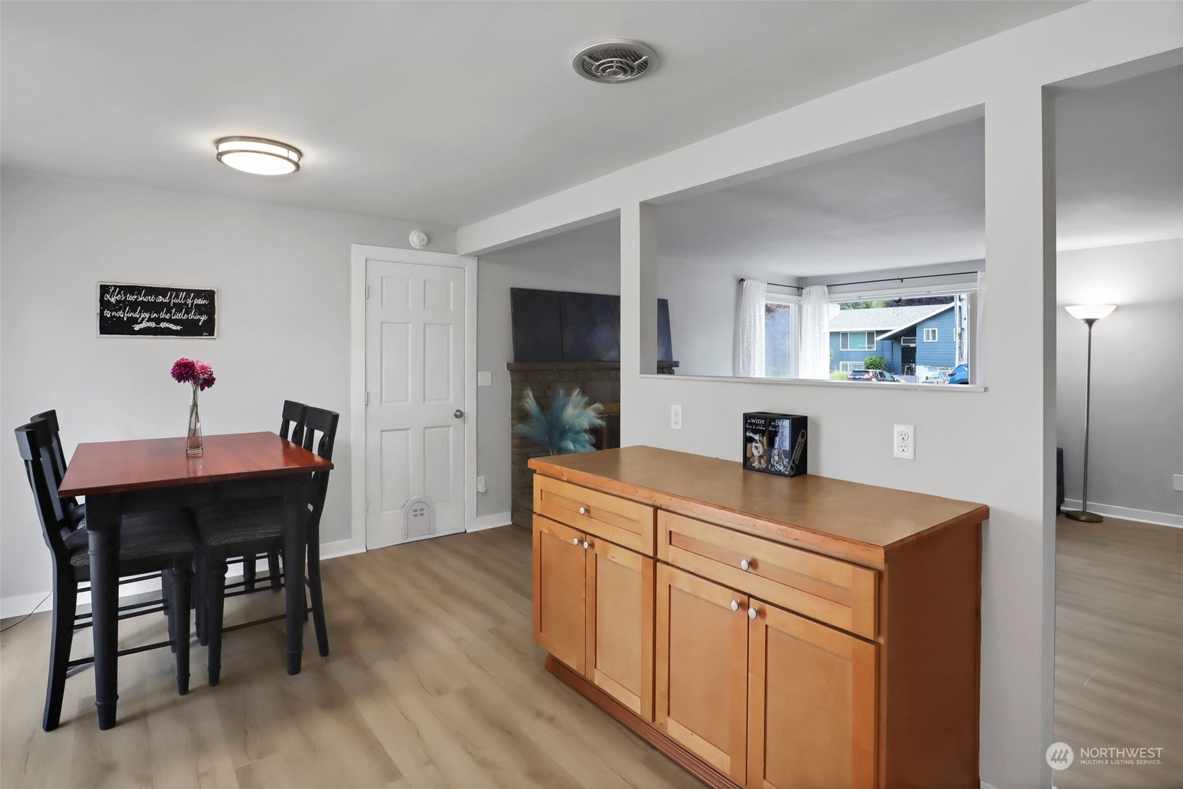 11504 Southeast 178th Place Renton, WA 98055 - Photo 19 of 30 a view of a dining room with furniture and wooden floor
