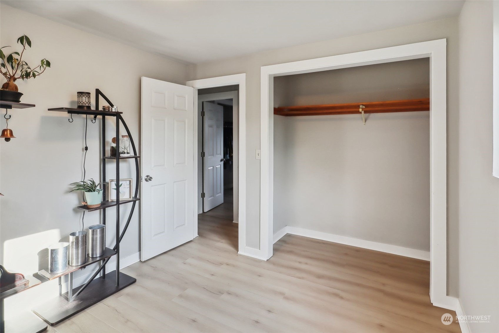 11504 Southeast 178th Place Renton, WA 98055 - Photo 22 of 30 a view of a room with wooden floor and stairs