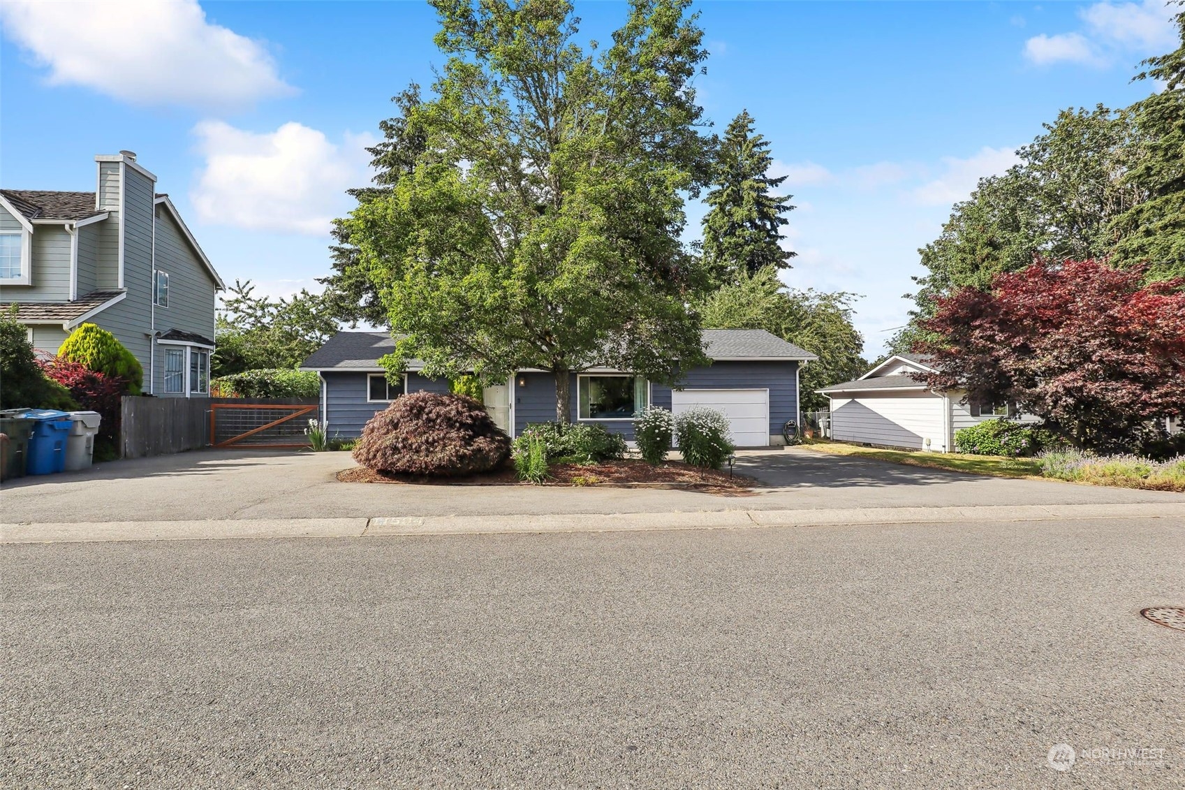 11504 Southeast 178th Place Renton, WA 98055 - Photo 3 of 30 front view of a house with a street