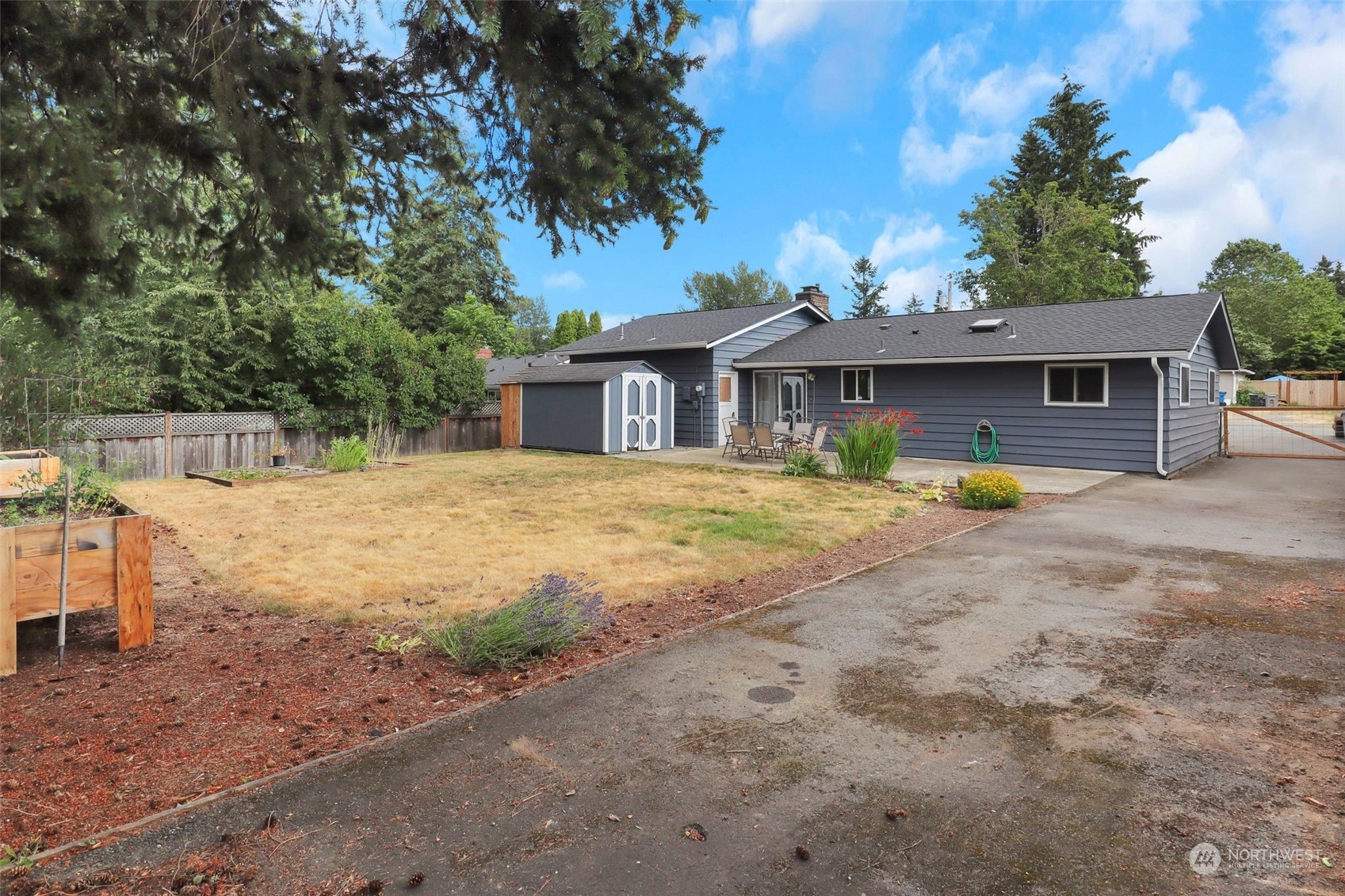 11504 Southeast 178th Place Renton, WA 98055 - Photo 8 of 30 a view of a house with a yard