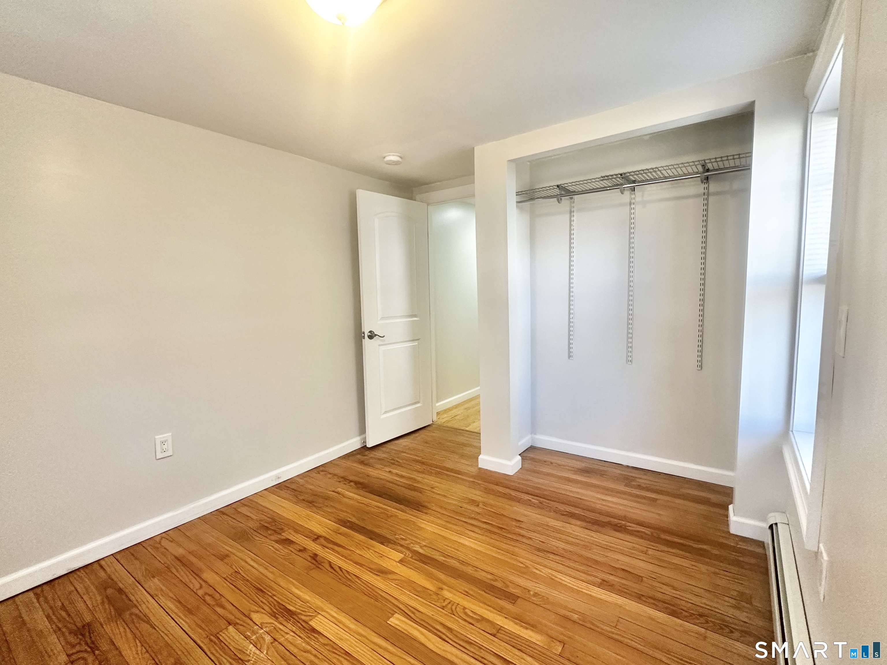 49 Pleasant Street Ansonia, CT 06401 - Photo 9 of 17 a view of an empty room