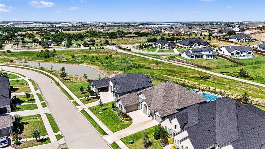 573 Broadleaf Way Haslet, TX 76052 - Photo 34 of 35 an aerial view of residential houses with outdoor space and swimming pool