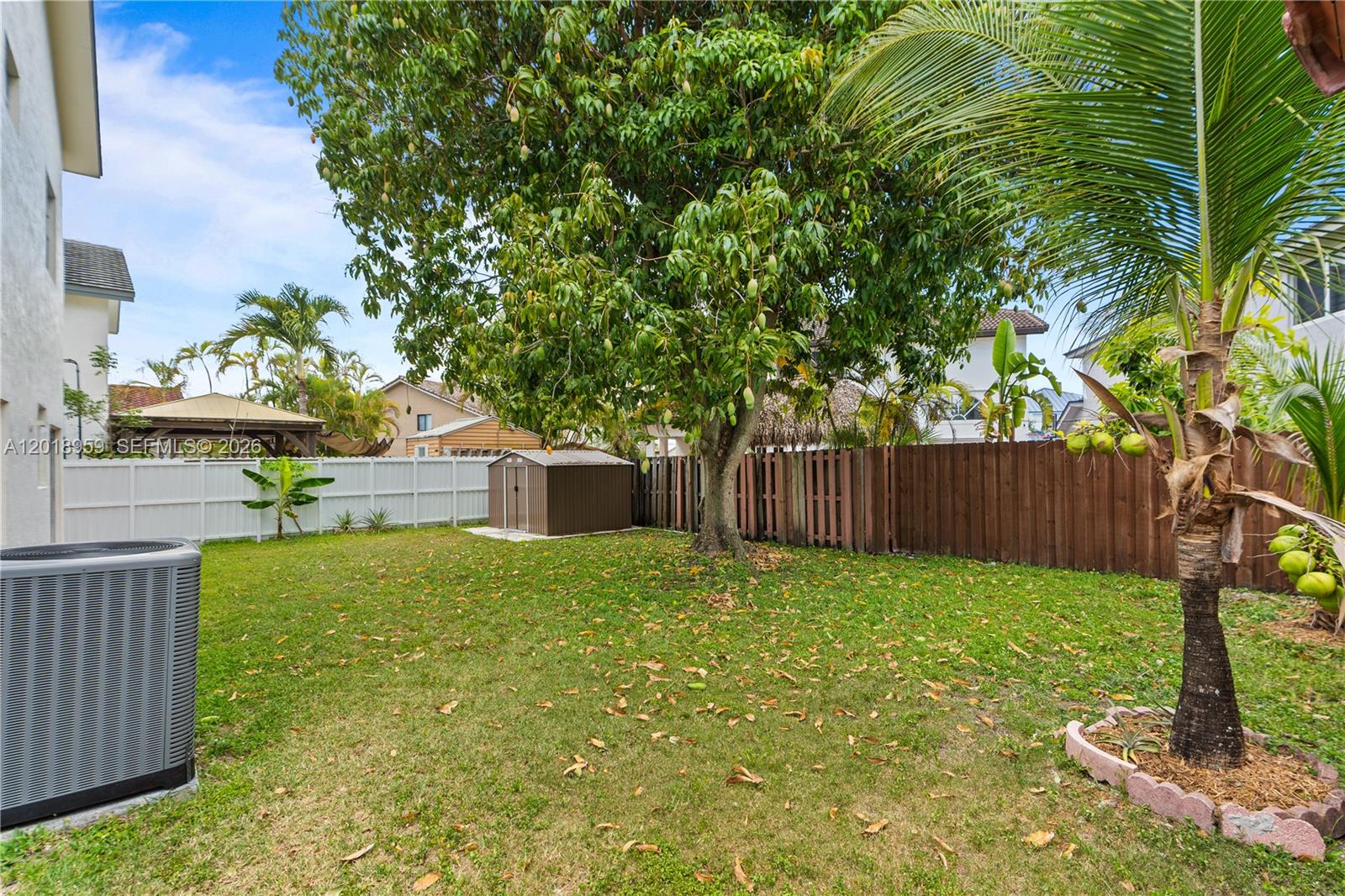 15345 Southwest 63rd Terrace Miami, FL 33193 - Photo 46 of 51 a house view with a garden space