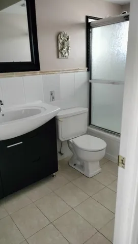 a view of a hallway with seating area