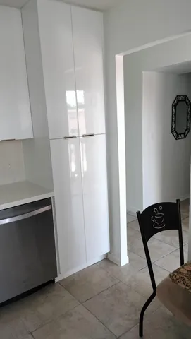 a view of a building with a yard