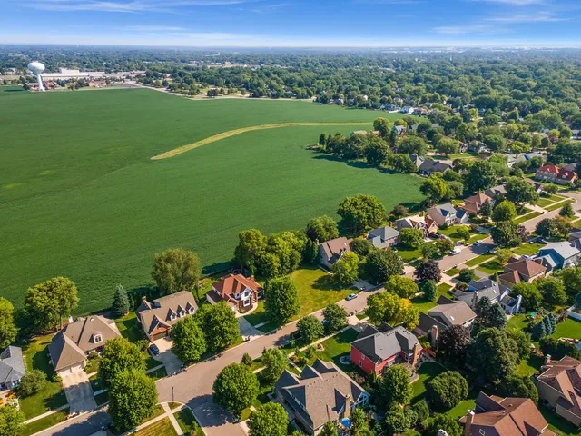 a view of a city with lots of trees