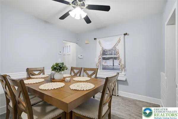 a view of a dining room with furniture