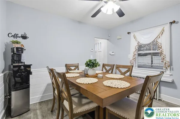 a view of a dining room with furniture