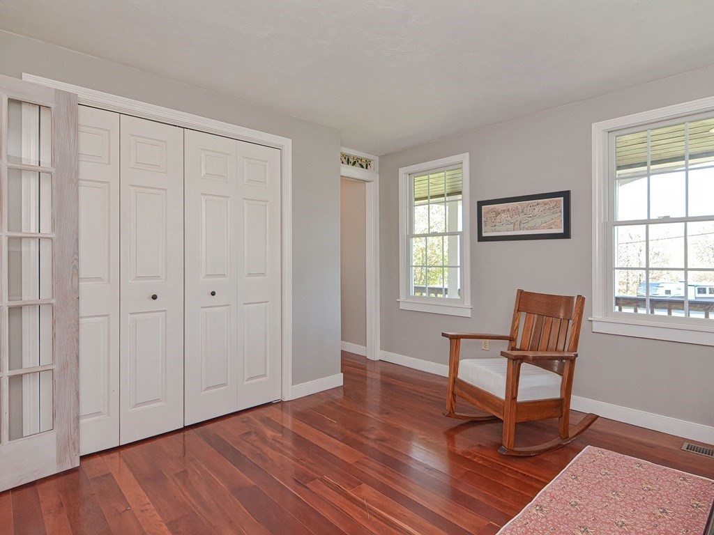 89 McClellan Road Sutton, MA 01590 - Photo 19 of 42 a view of a livingroom with furniture and wooden floor