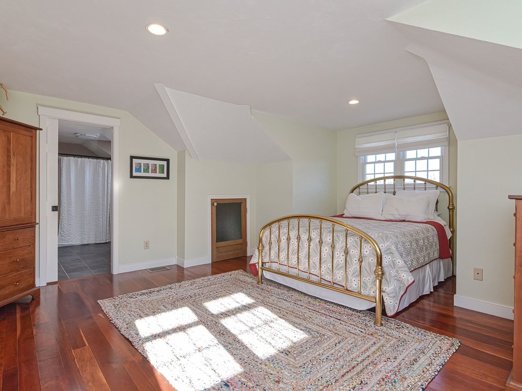89 McClellan Road Sutton, MA 01590 - Photo 22 of 42 a bedroom with a bed and a window