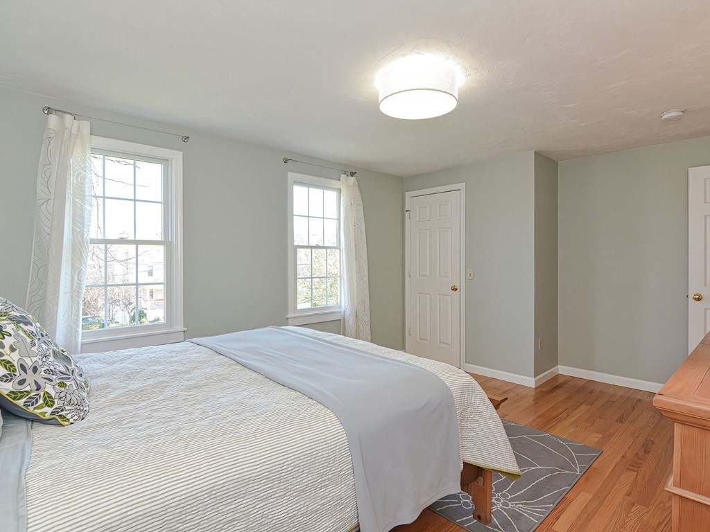 89 McClellan Road Sutton, MA 01590 - Photo 28 of 42 a bedroom with a bed and a window