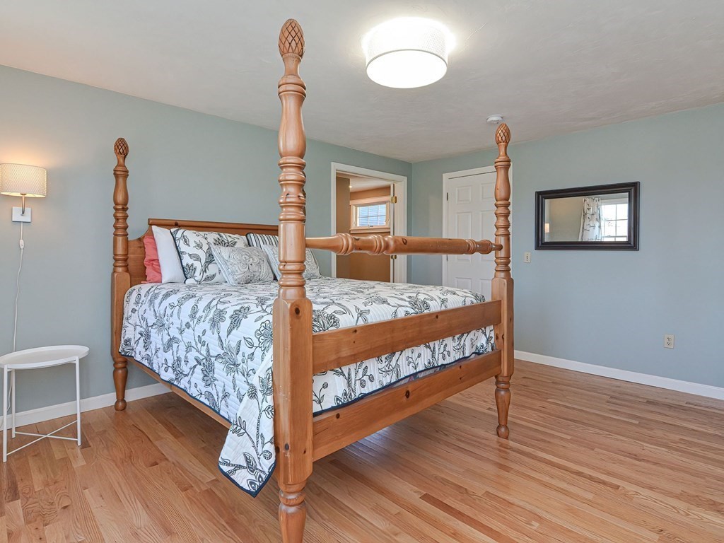 89 McClellan Road Sutton, MA 01590 - Photo 33 of 42 a bed sitting in a bedroom next to a window