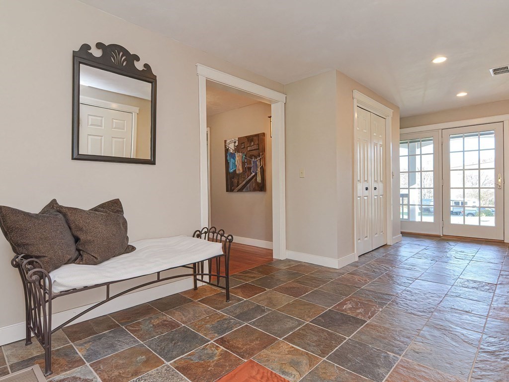 89 McClellan Road Sutton, MA 01590 - Photo 5 of 42 a living room with furniture and a window
