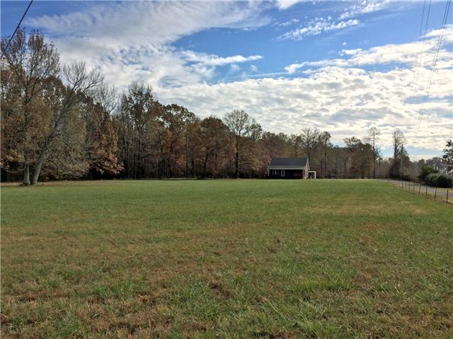 5729 Hopewell Road Springfield, TN 37172 - Photo 11 of 12 a view of a field with grass and trees