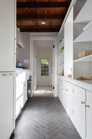 a hallway with washer and dryer