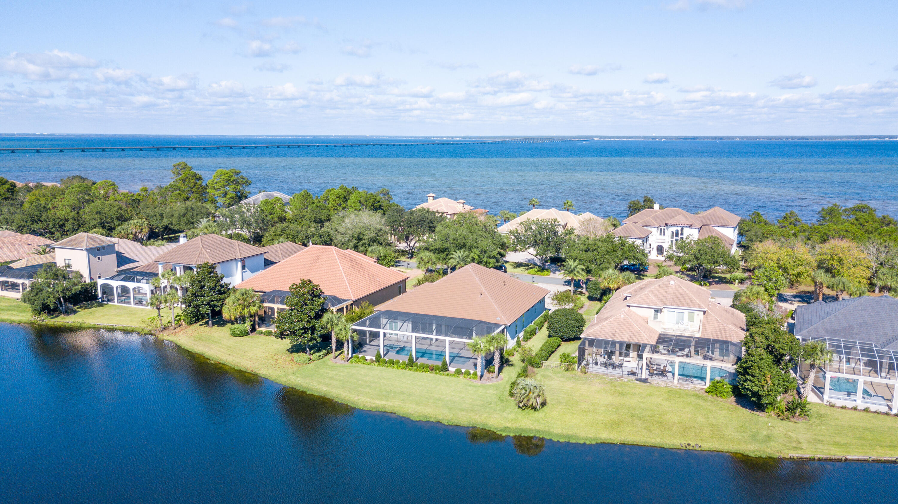 an aerial view of house with yard swimming pool and outdoor seating