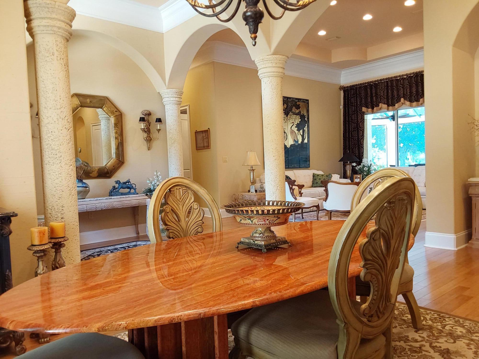 473 Captains Circle Destin, FL 32541 - Photo 16 of 64 a dining room with furniture and window