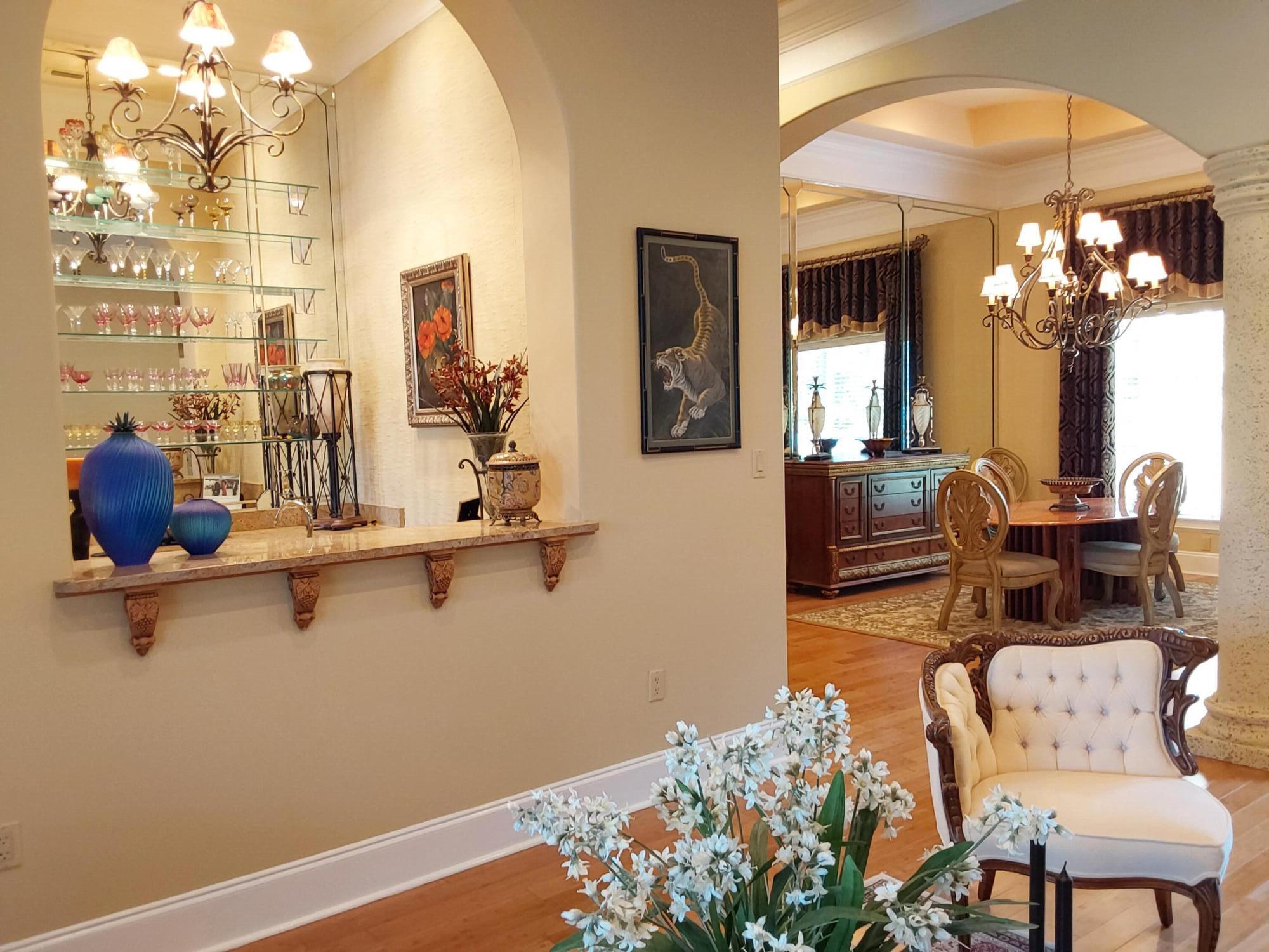 473 Captains Circle Destin, FL 32541 - Photo 20 of 64 a living room with furniture and a chandelier