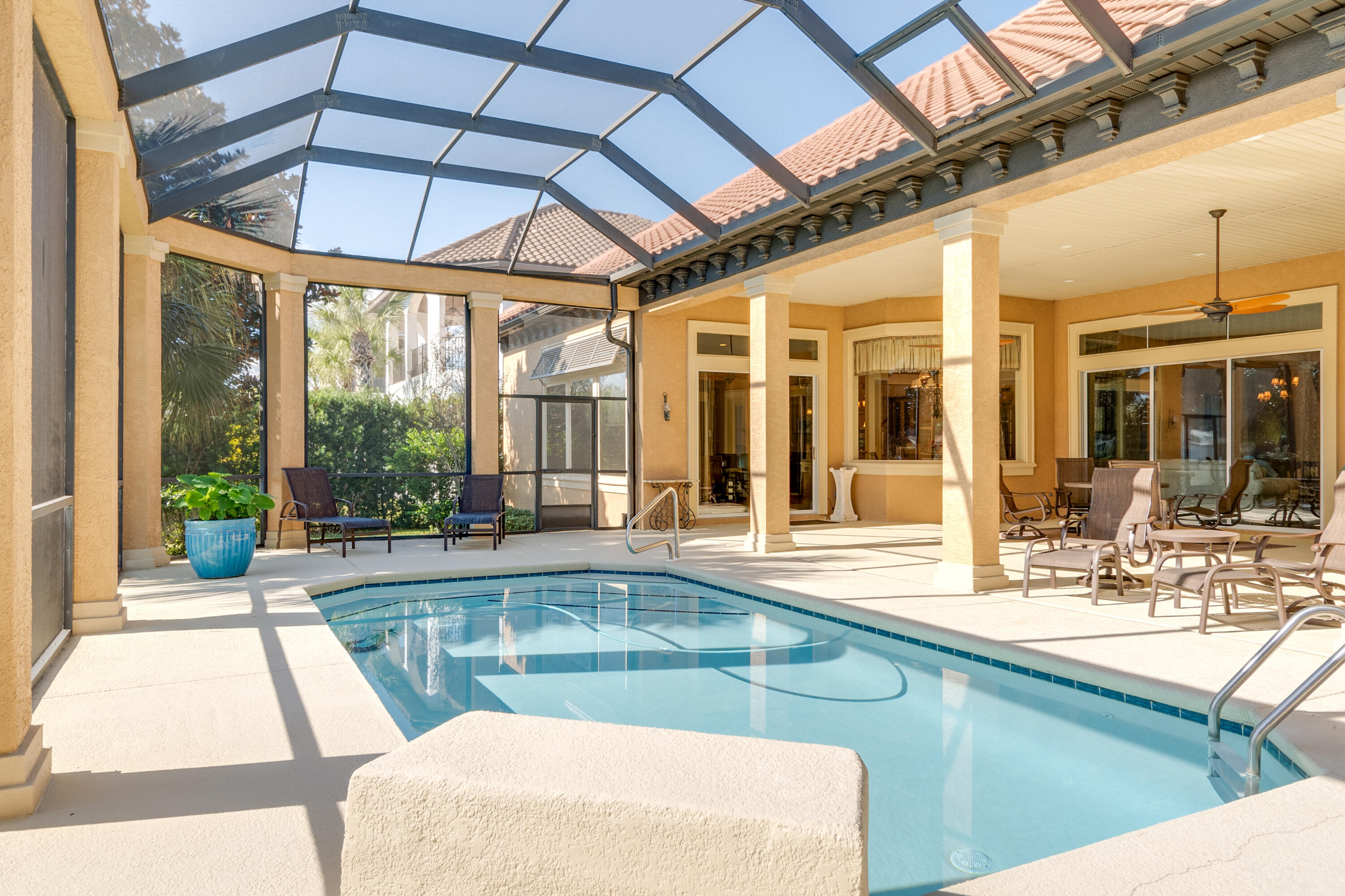 473 Captains Circle Destin, FL 32541 - Photo 38 of 64 a view of a patio with a table and chairs
