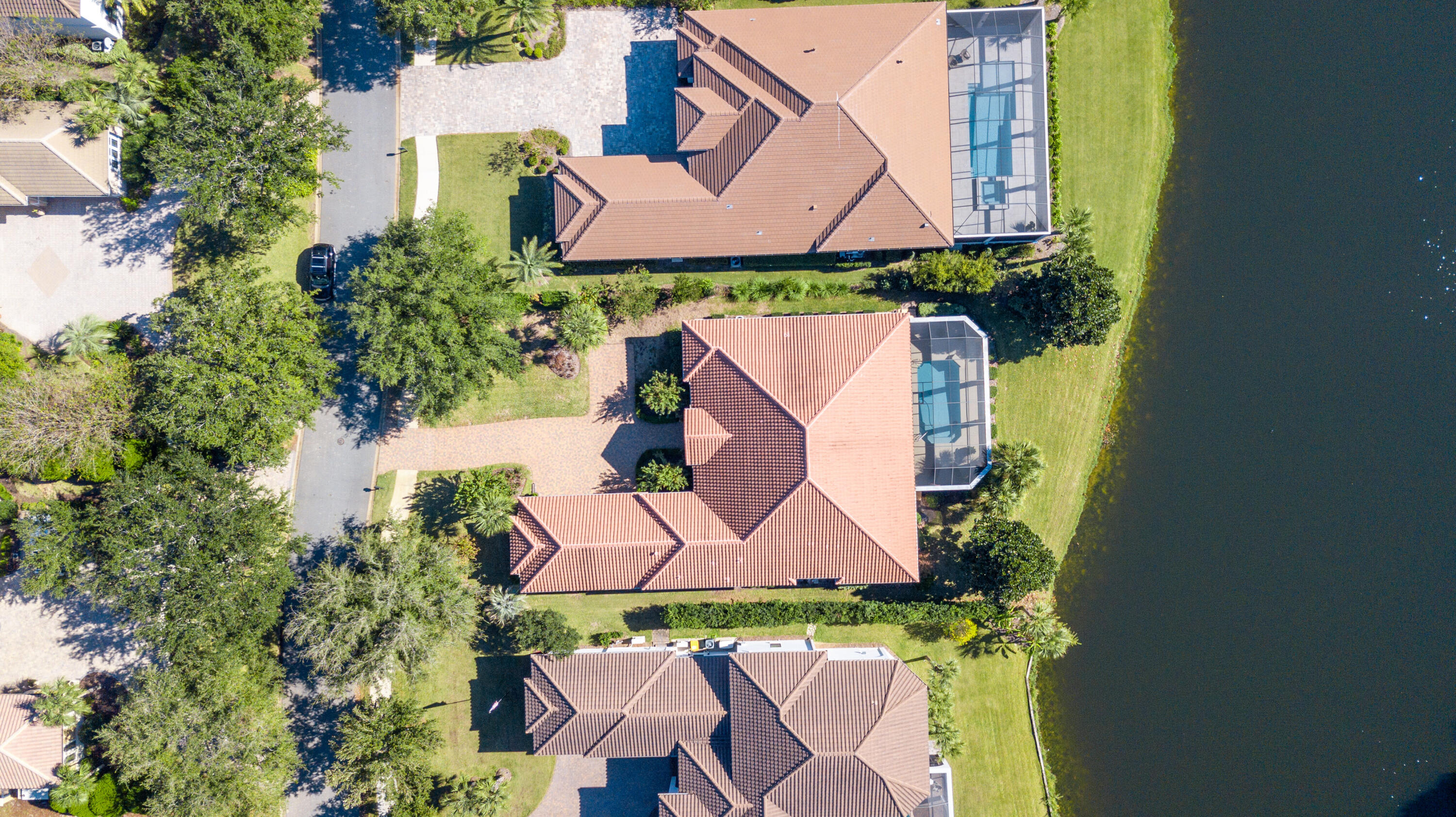 473 Captains Circle Destin, FL 32541 - Photo 40 of 64 an aerial view of a house with a garden and a yard