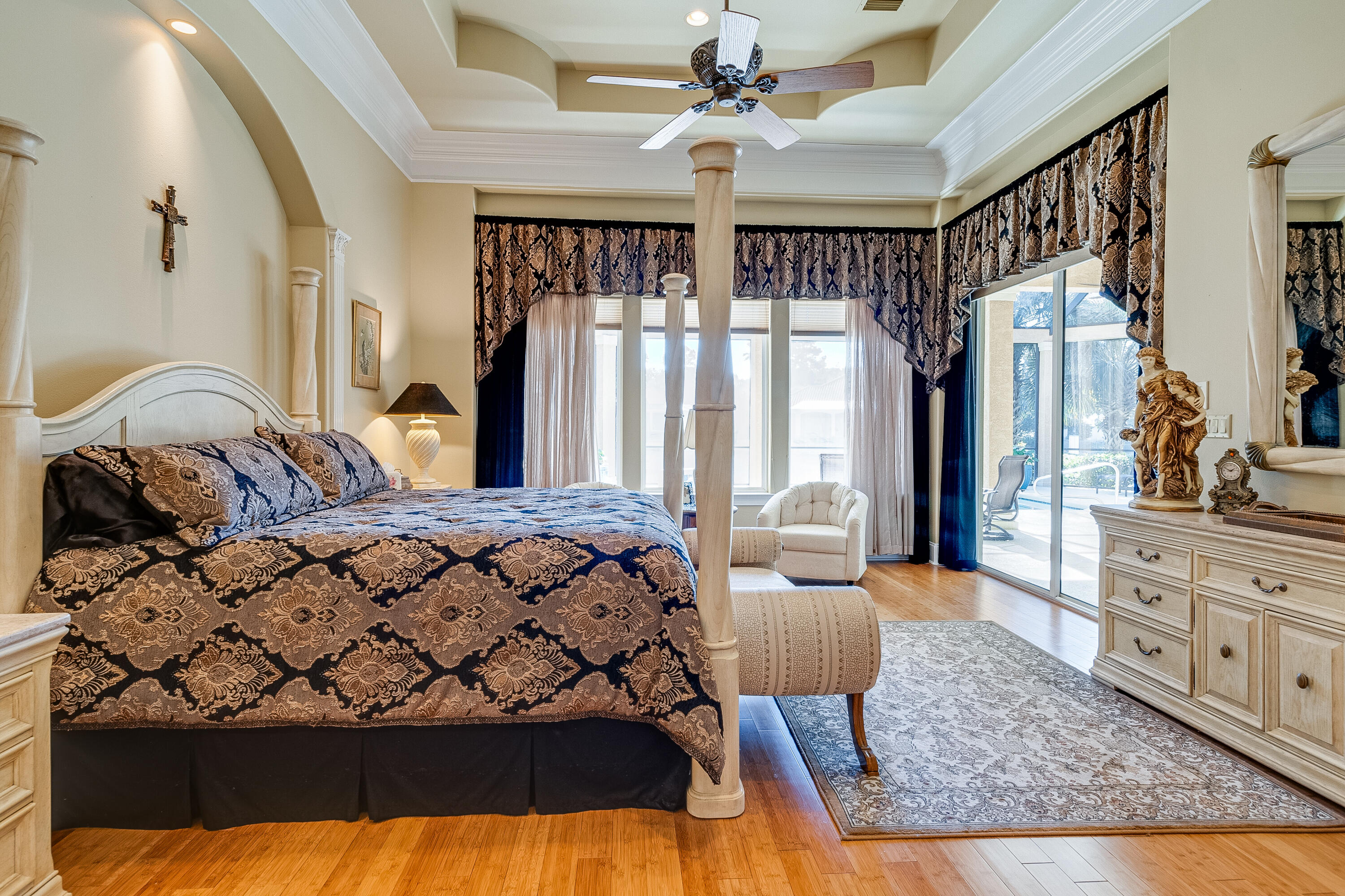 473 Captains Circle Destin, FL 32541 - Photo 46 of 64 a bedroom with a large bed and a dresser