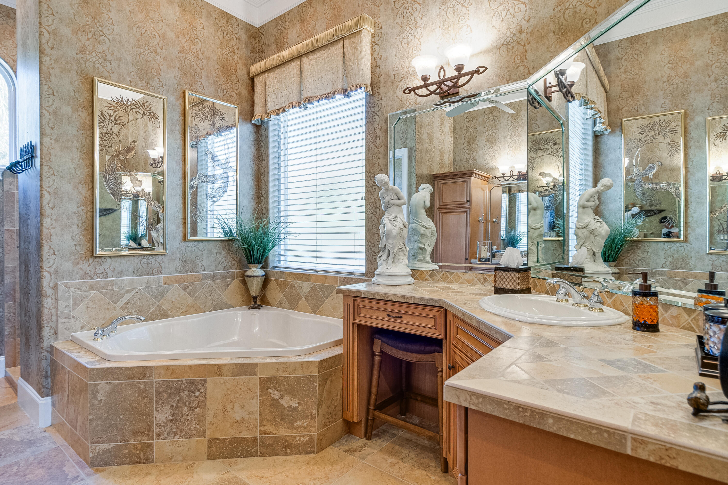 473 Captains Circle Destin, FL 32541 - Photo 50 of 64 a spacious bathroom with a tub sink and mirror