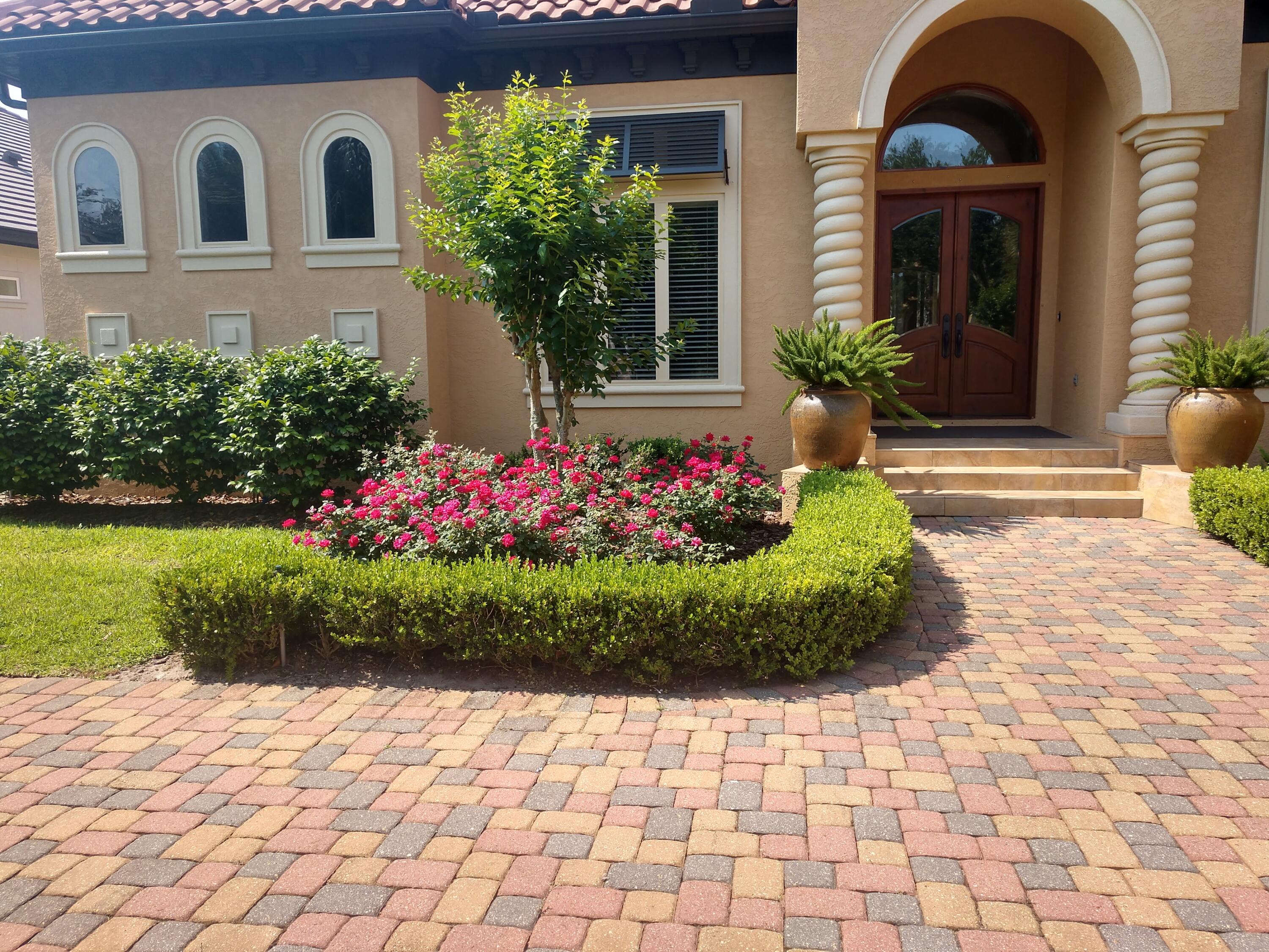473 Captains Circle Destin, FL 32541 - Photo 9 of 64 a front view of a house with a yard