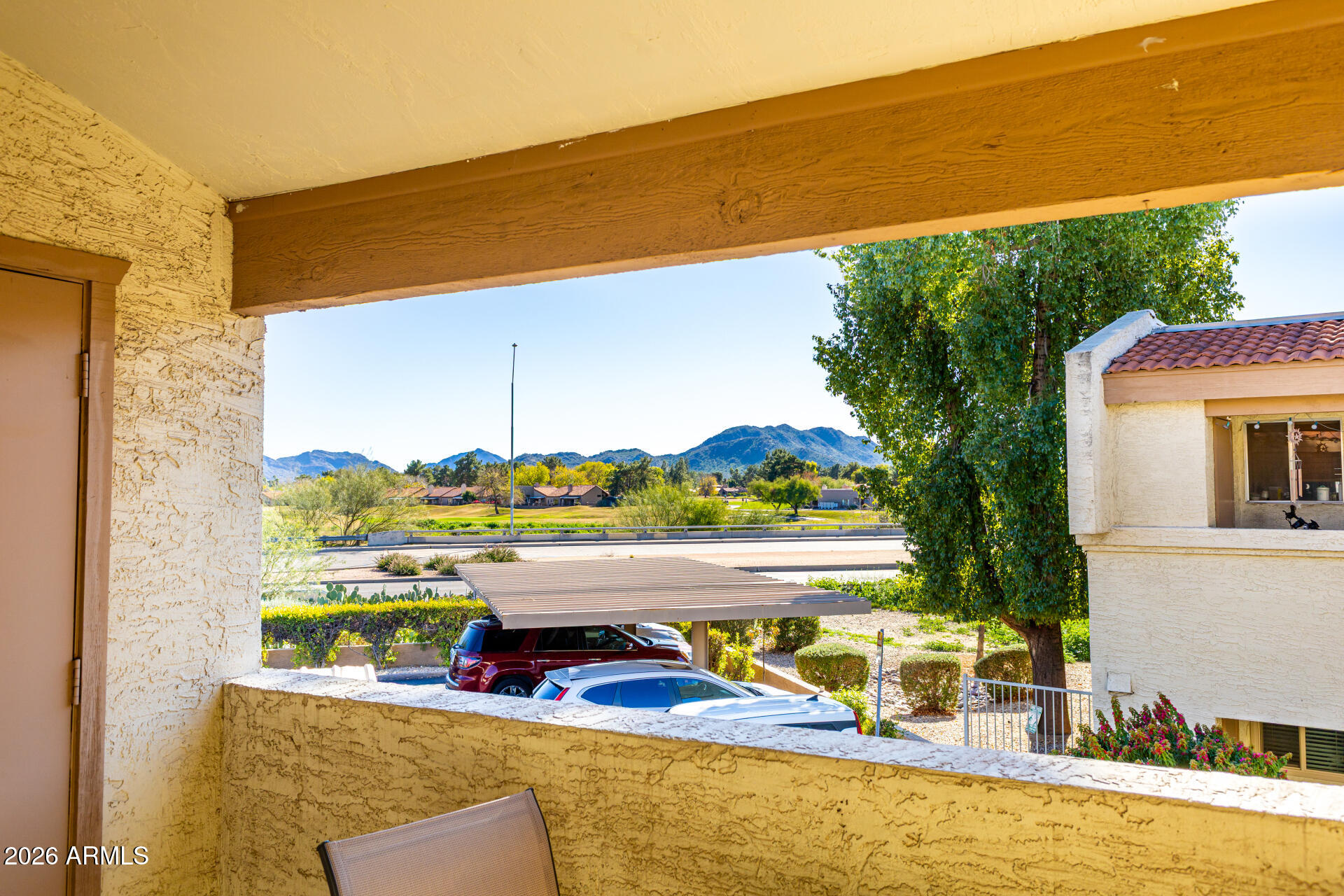 4150 East Cactus Road, Unit 210 Phoenix, AZ 85032 - Photo 14 of 45 a view of a swimming pool with furniture