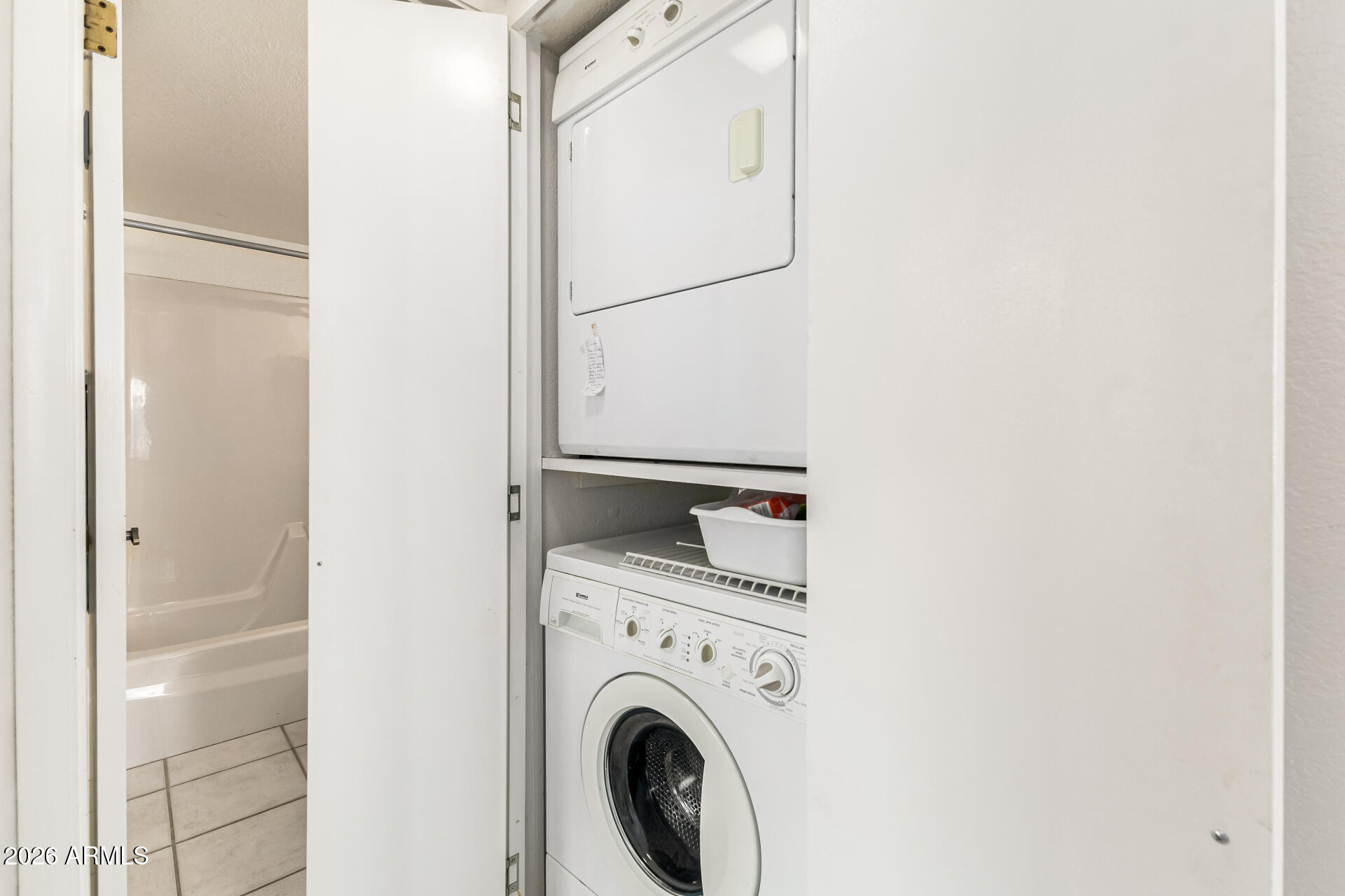 4150 East Cactus Road, Unit 210 Phoenix, AZ 85032 - Photo 31 of 45 a utility room with dryer and washer