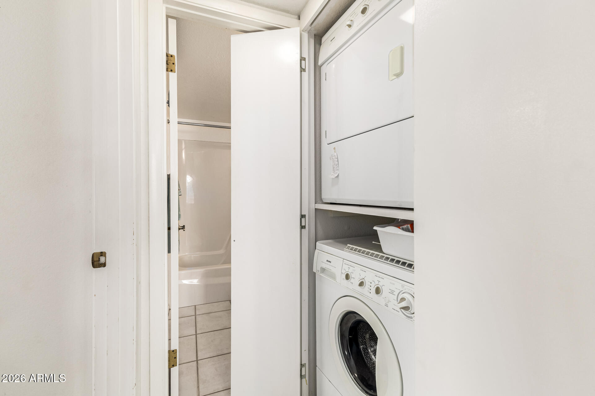 4150 East Cactus Road, Unit 210 Phoenix, AZ 85032 - Photo 32 of 45 a view of livingroom with washer and dryer