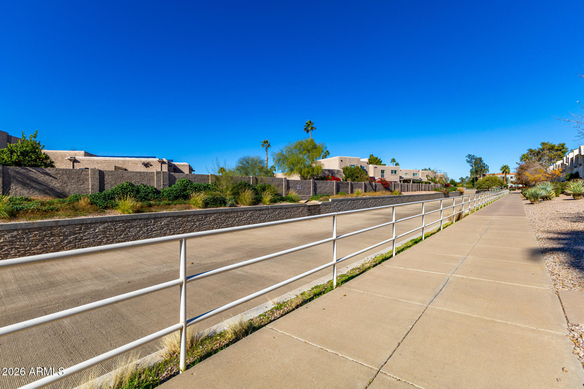 4150 East Cactus Road, Unit 210 Phoenix, AZ 85032 - Photo 40 of 45 a view of a balcony with an outdoor space