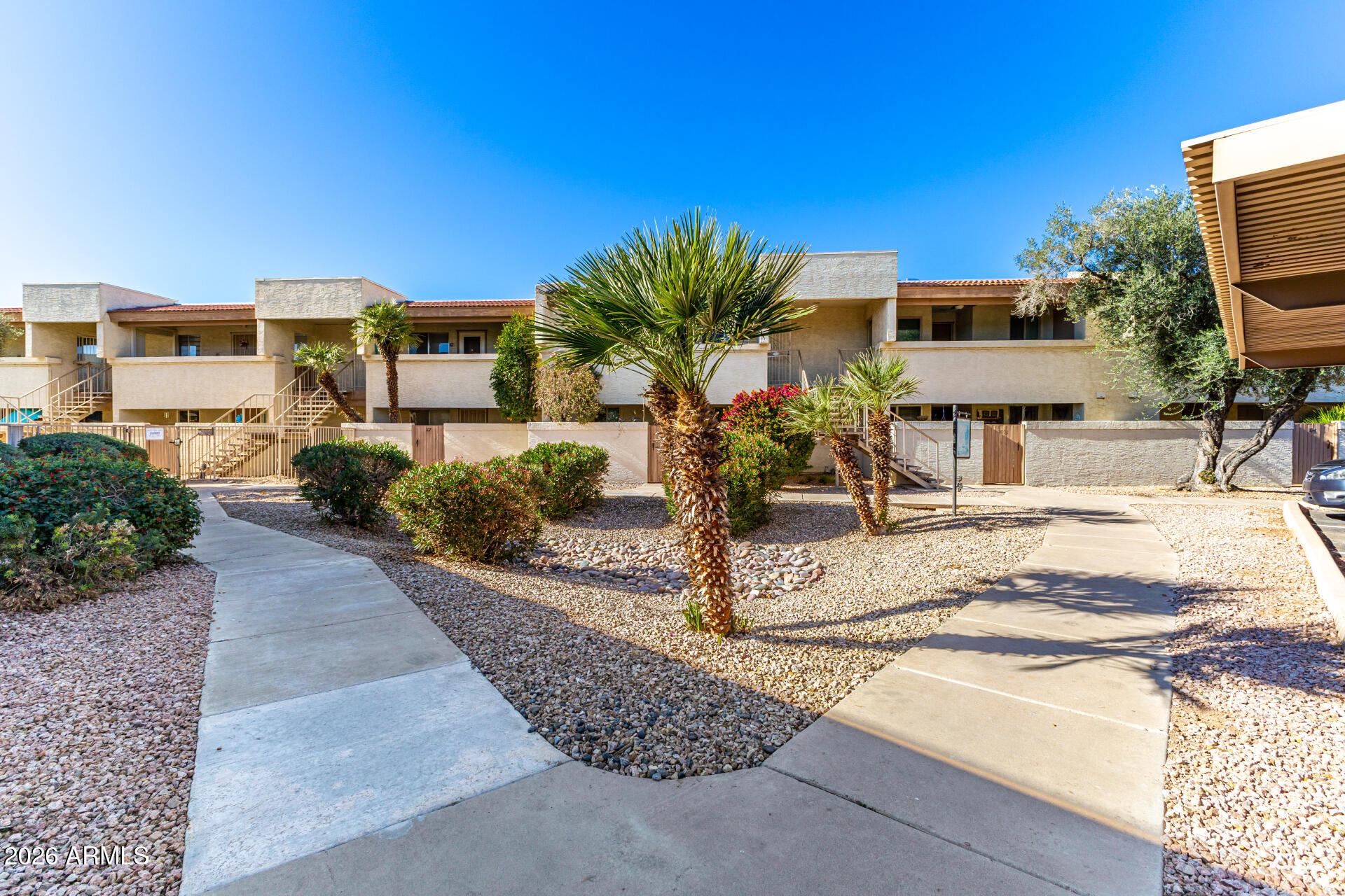 4150 East Cactus Road, Unit 210 Phoenix, AZ 85032 - Photo 42 of 45 a view of a house with backyard and sitting area