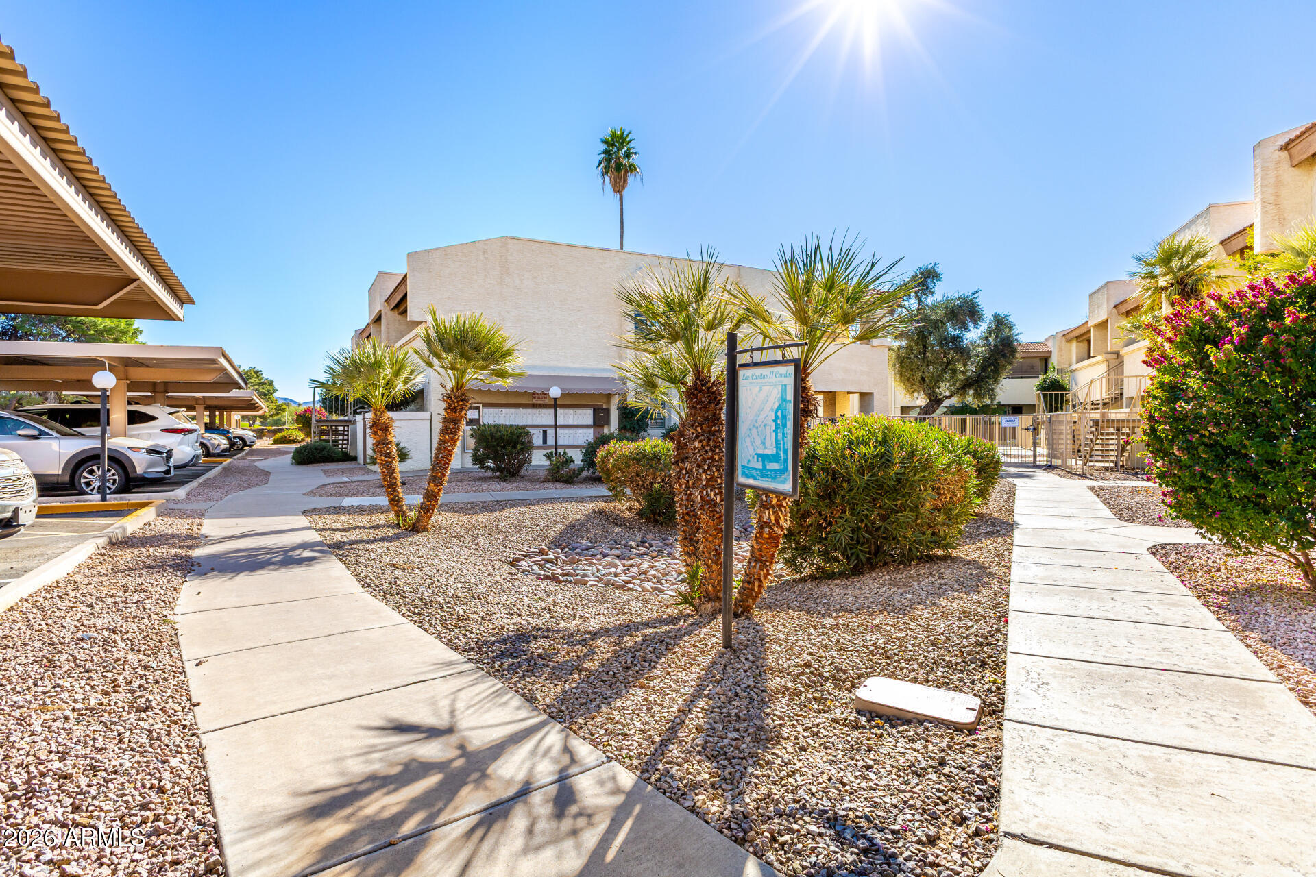 4150 East Cactus Road, Unit 210 Phoenix, AZ 85032 - Photo 43 of 45 a view of a house with a patio