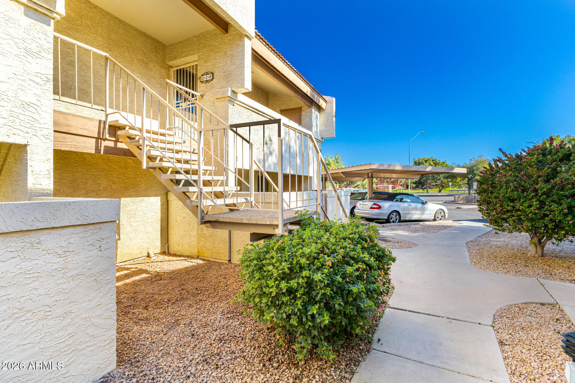 4150 East Cactus Road, Unit 210 Phoenix, AZ 85032 - Photo 5 of 45 a view of a street with cars