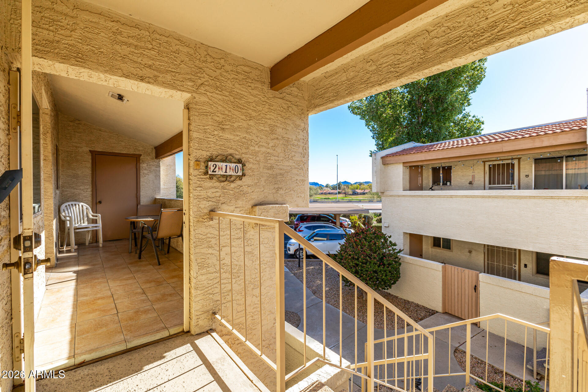 4150 East Cactus Road, Unit 210 Phoenix, AZ 85032 - Photo 6 of 45 a view of balcony with furniture