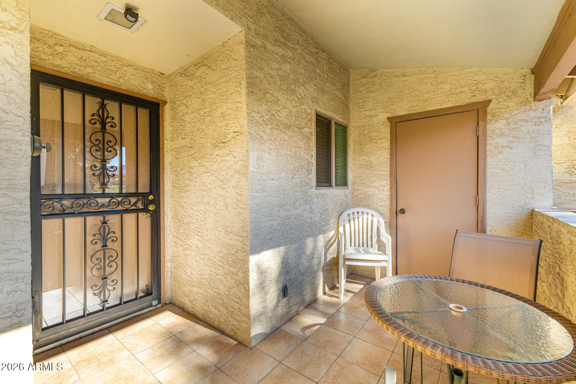 4150 East Cactus Road, Unit 210 Phoenix, AZ 85032 - Photo 9 of 45 a room with furniture and windows