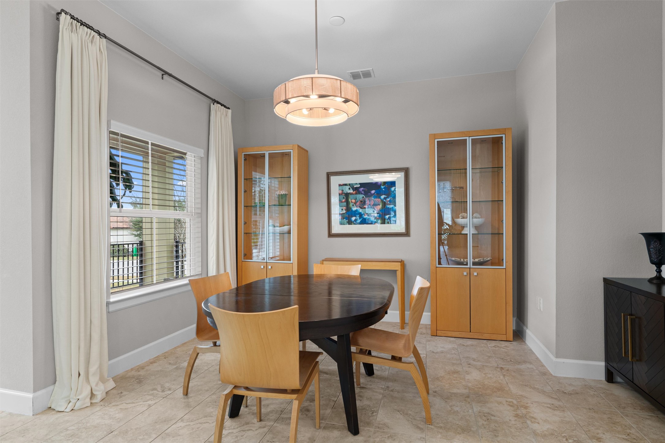313 Racing Oak Loop San Marcos, TX 78666 - Photo 12 of 39 Nice sized dining room near the entry and kitchen. Room for a large dining table plus sideboard and china cabinet