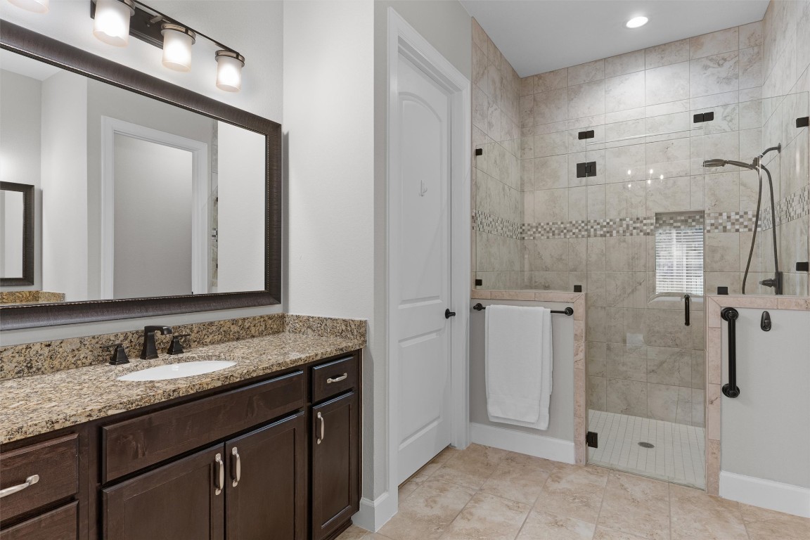 313 Racing Oak Loop San Marcos, TX 78666 - Photo 22 of 39 Very nice tile surround, an inset for body wash/shampoo and a shower head with sprayer.