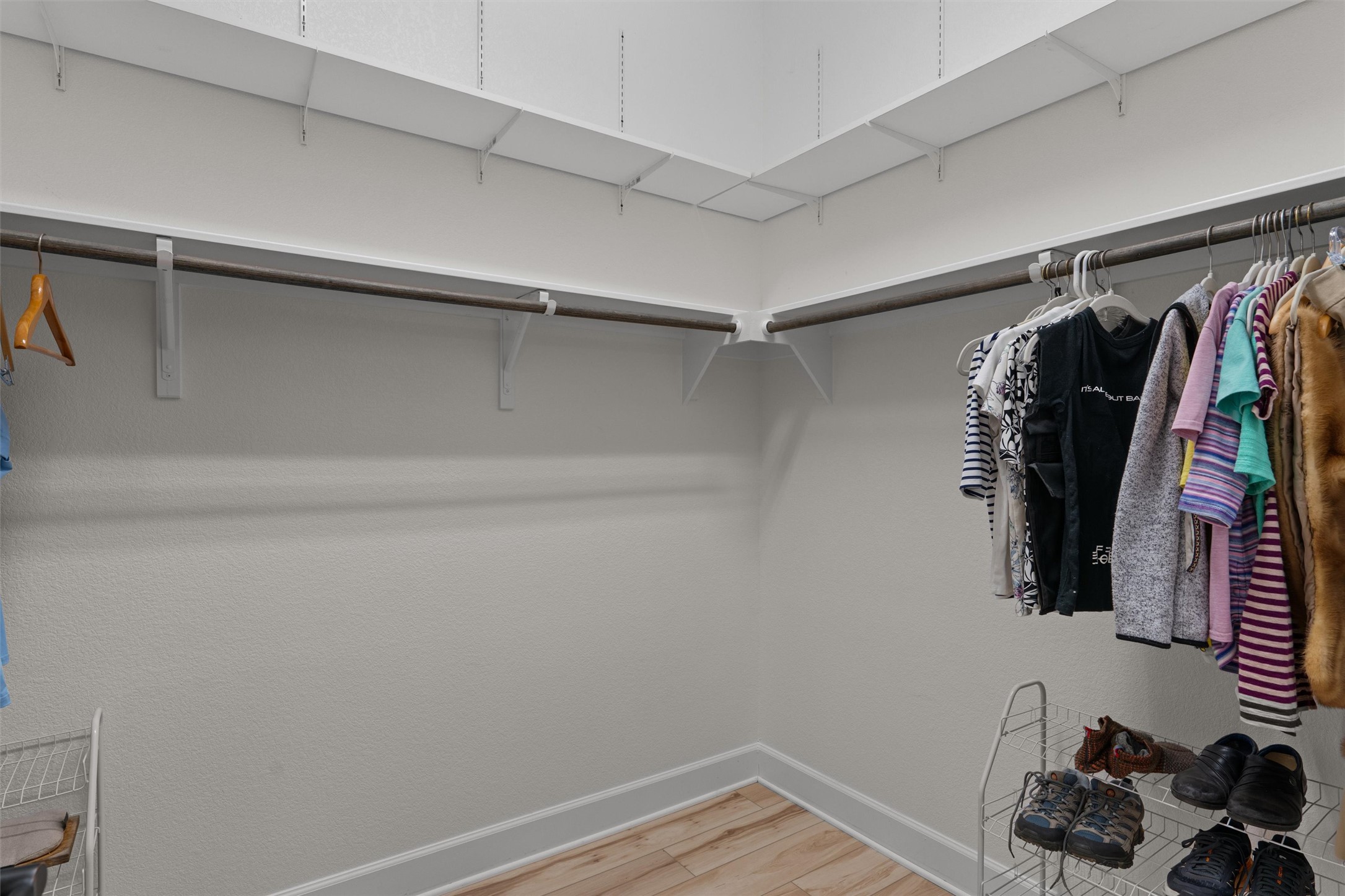 313 Racing Oak Loop San Marcos, TX 78666 - Photo 24 of 39 a view of walk in closet with clothes and shoes