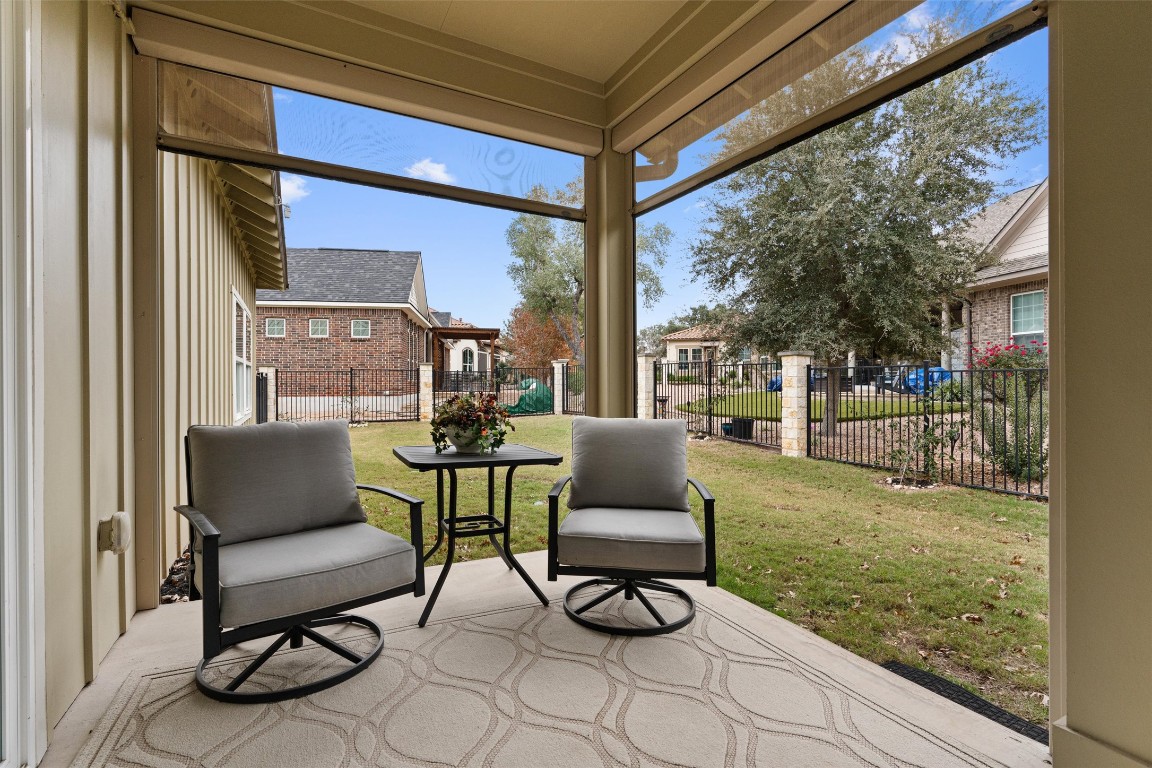 313 Racing Oak Loop San Marcos, TX 78666 - Photo 32 of 39 End of patio overlooking the large yard for your dogs to play or to have your garden