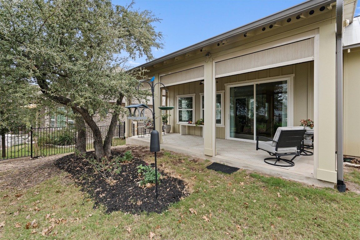 313 Racing Oak Loop San Marcos, TX 78666 - Photo 33 of 39 Patio and view of the trees/grass