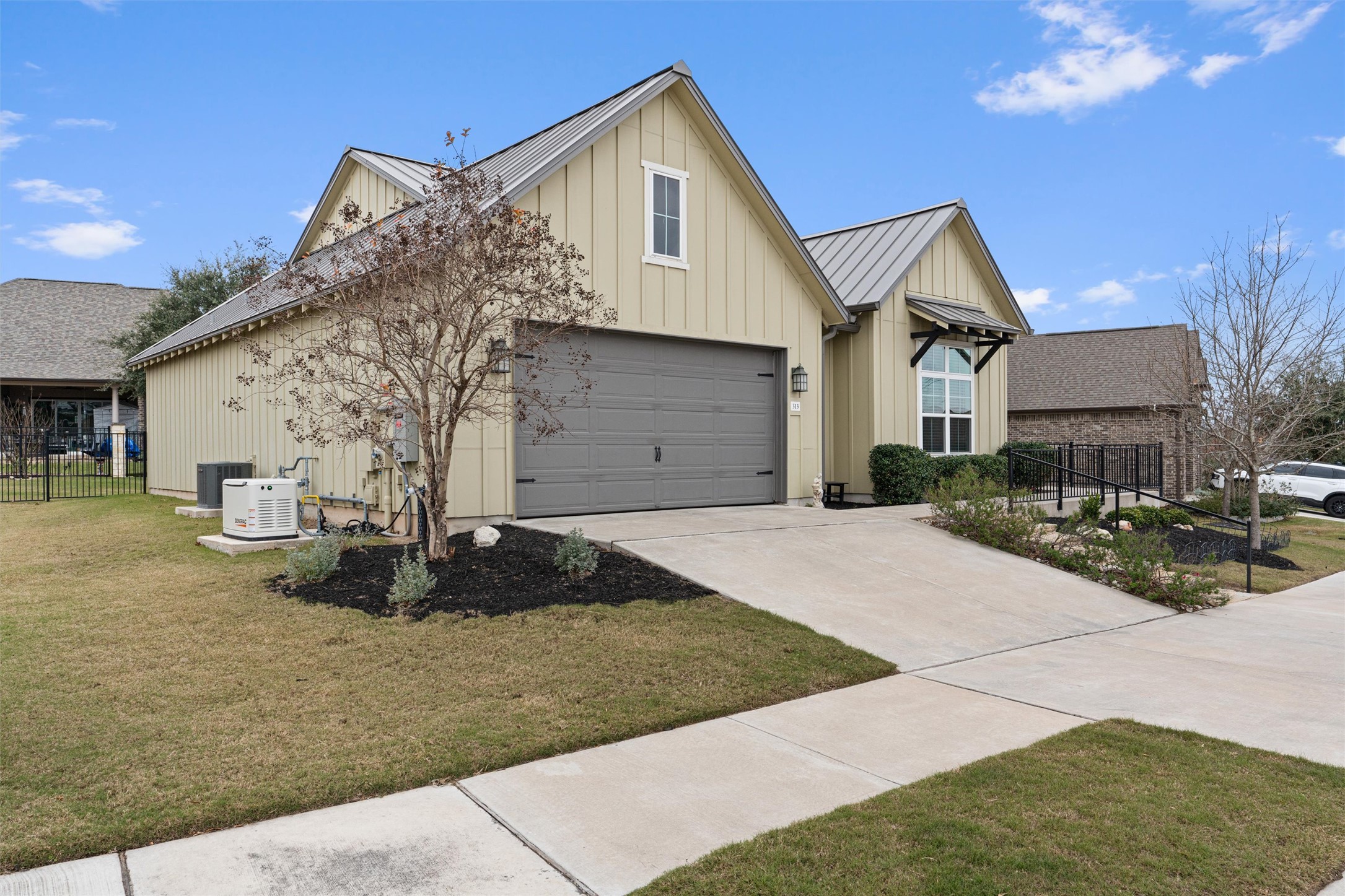 313 Racing Oak Loop San Marcos, TX 78666 - Photo 4 of 39 a front view of a house with entertaining space