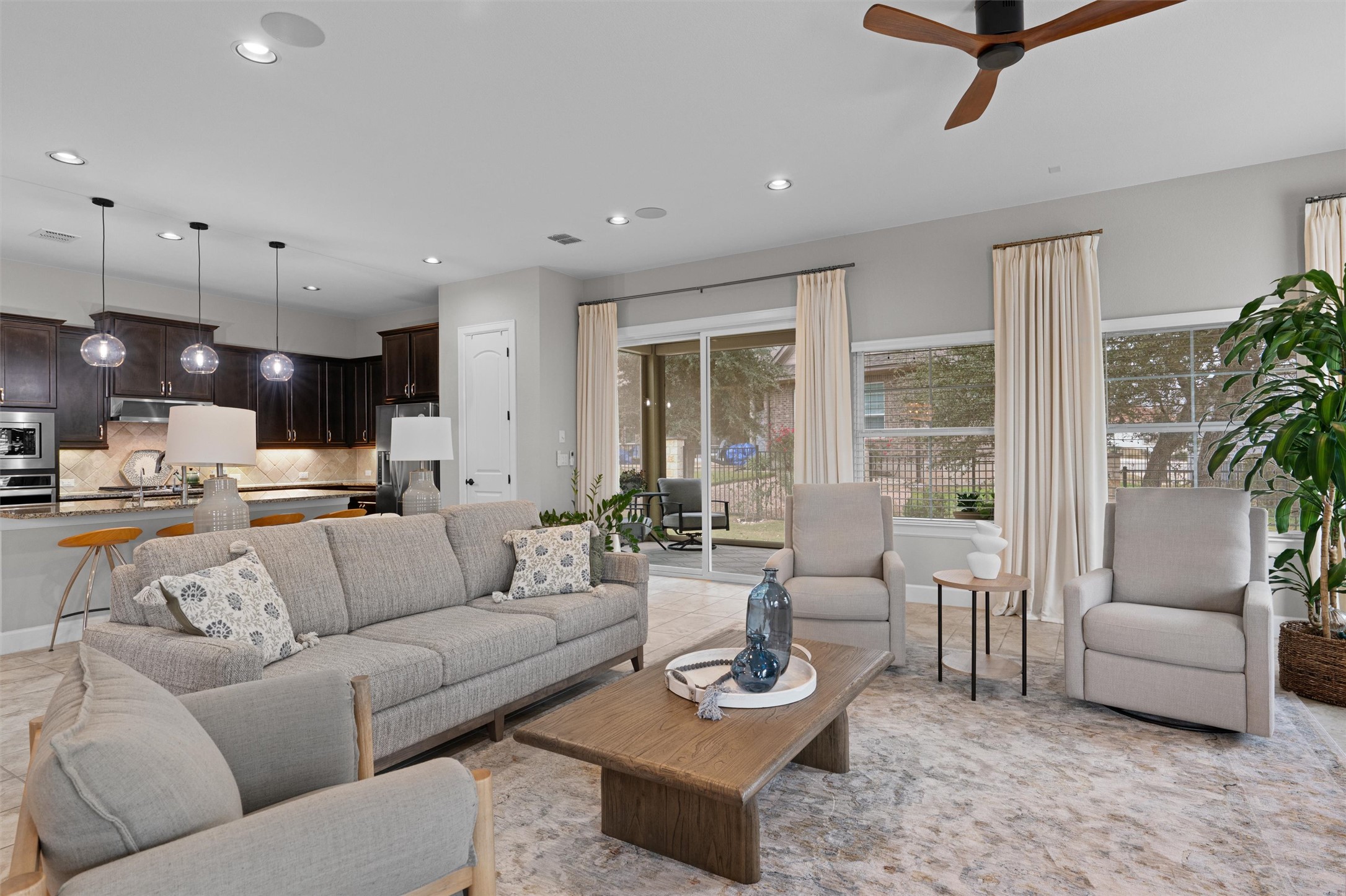 313 Racing Oak Loop San Marcos, TX 78666 - Photo 8 of 39 a living room with furniture and a large window