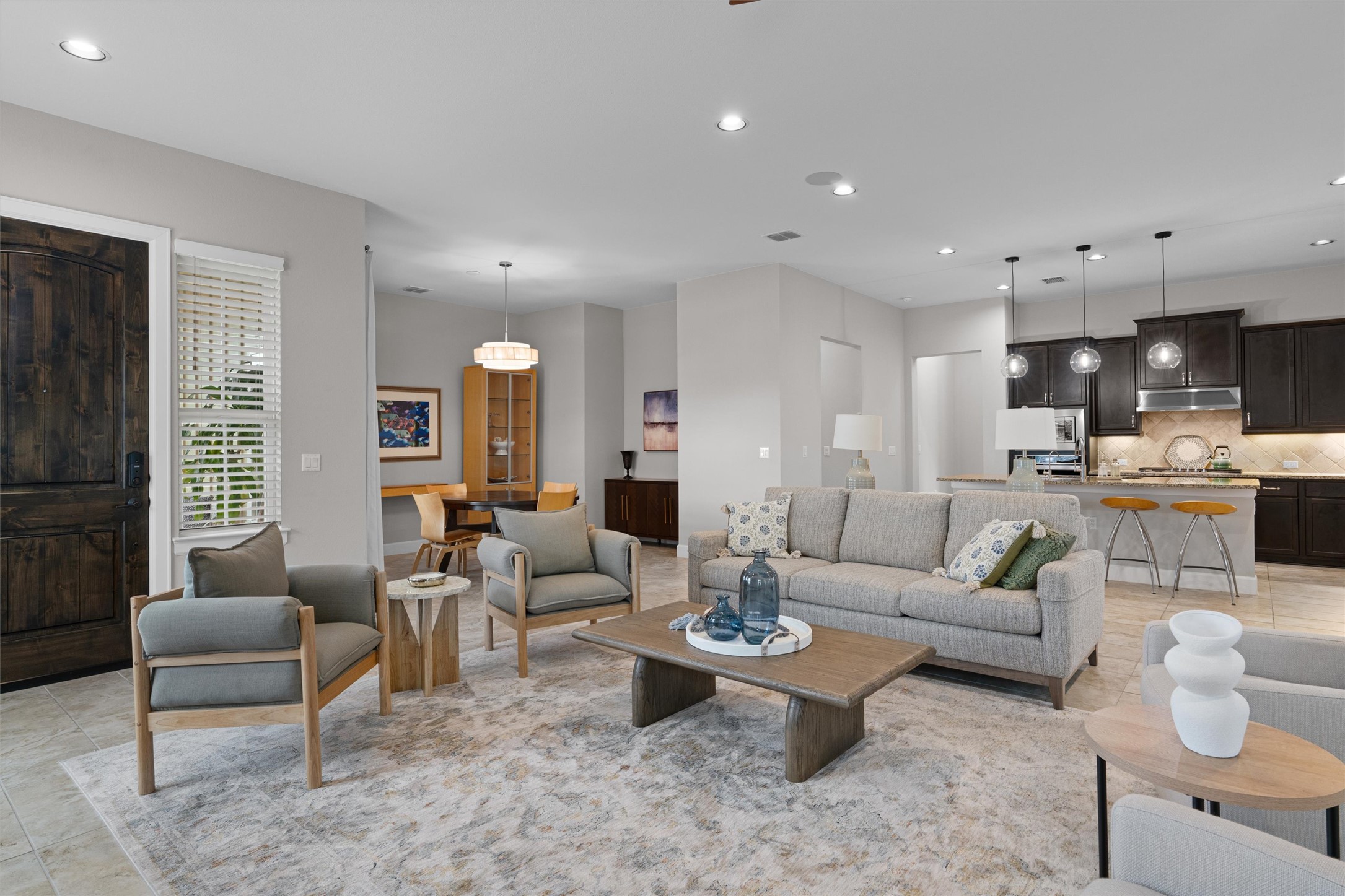 313 Racing Oak Loop San Marcos, TX 78666 - Photo 9 of 39 a living room with furniture and view of kitchen