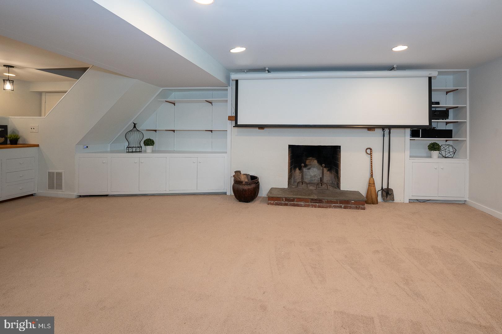 746 Mancill Road Wayne, PA 19087 - Photo 33 of 46 Lower level movie screen